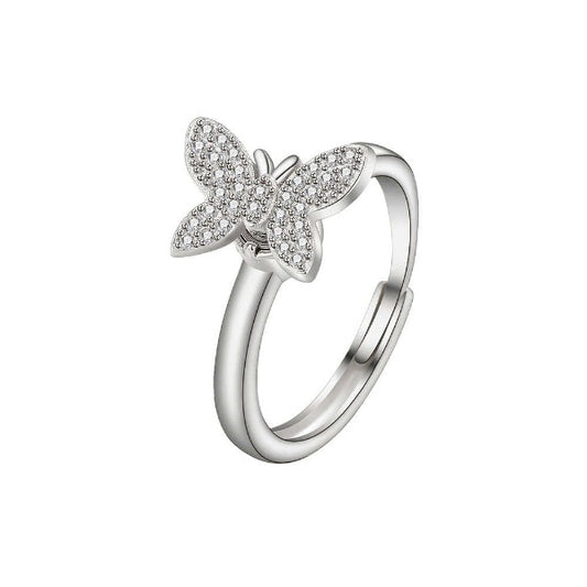 Butterfly fidget ring in sterling silver adjustable for size. Butterfly piece is in cubic zirconia and it fully rotates so you can spin away the anxiety.
