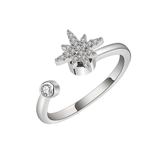 Sterling silver snowflake fidget ring for anxiety. The snowflake cubic zirconia piece spins.  Give that snowflake a twirl and watch it shine as it rotates. 